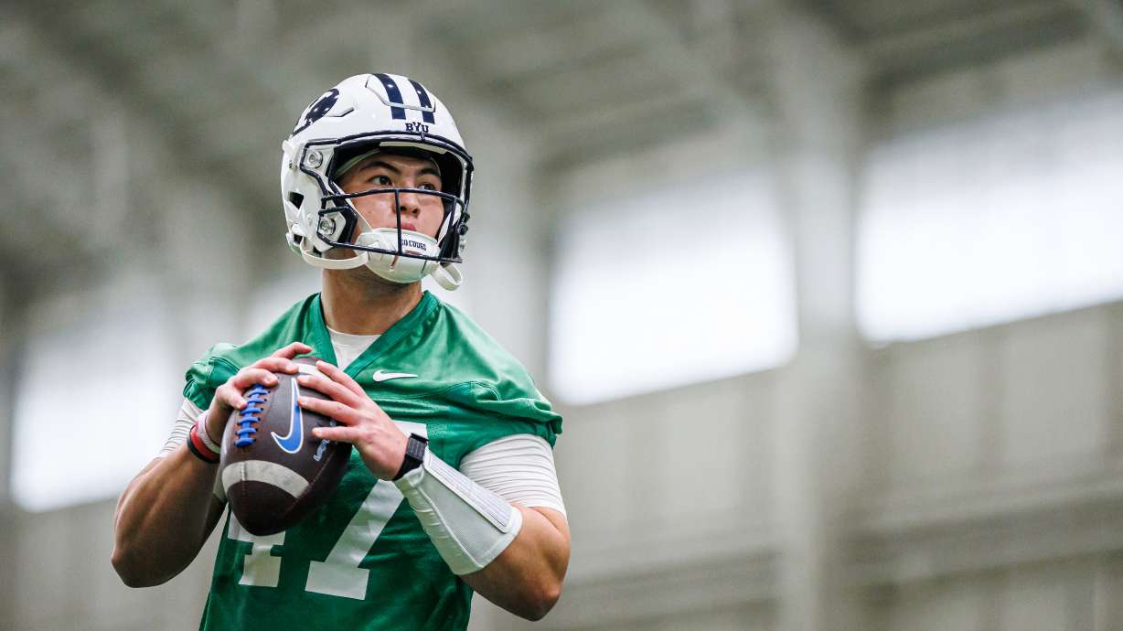 BYU quarterback Bear Bachmeier looks to pass during practice, Monday, March 2 2026 at the indoor practice facility in Provo, Utah.