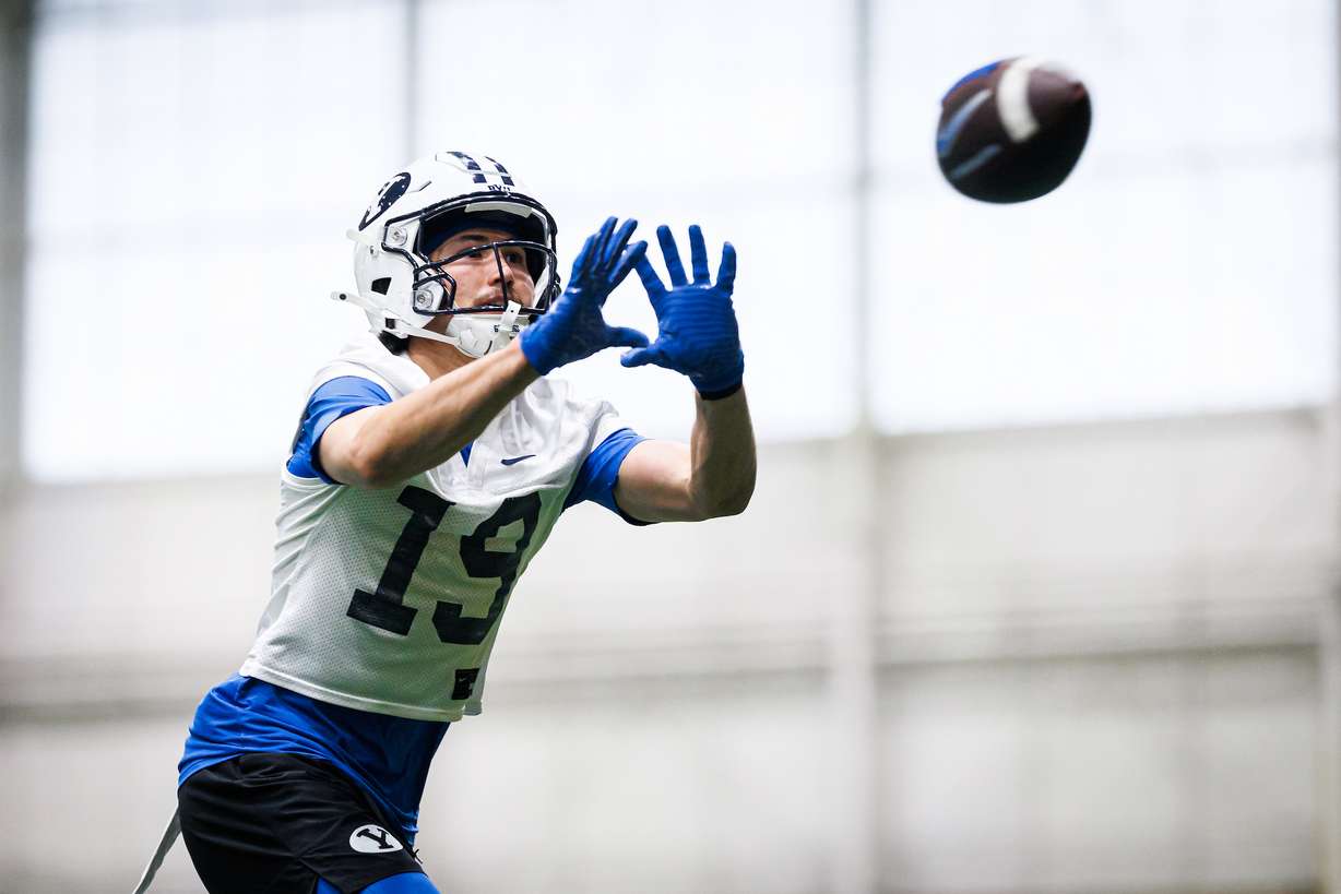 BYU wide receiver Tiger Bachmeier catches a pass during practice, Monday, March 2 2026 at the indoor practice facility in Provo, Utah.