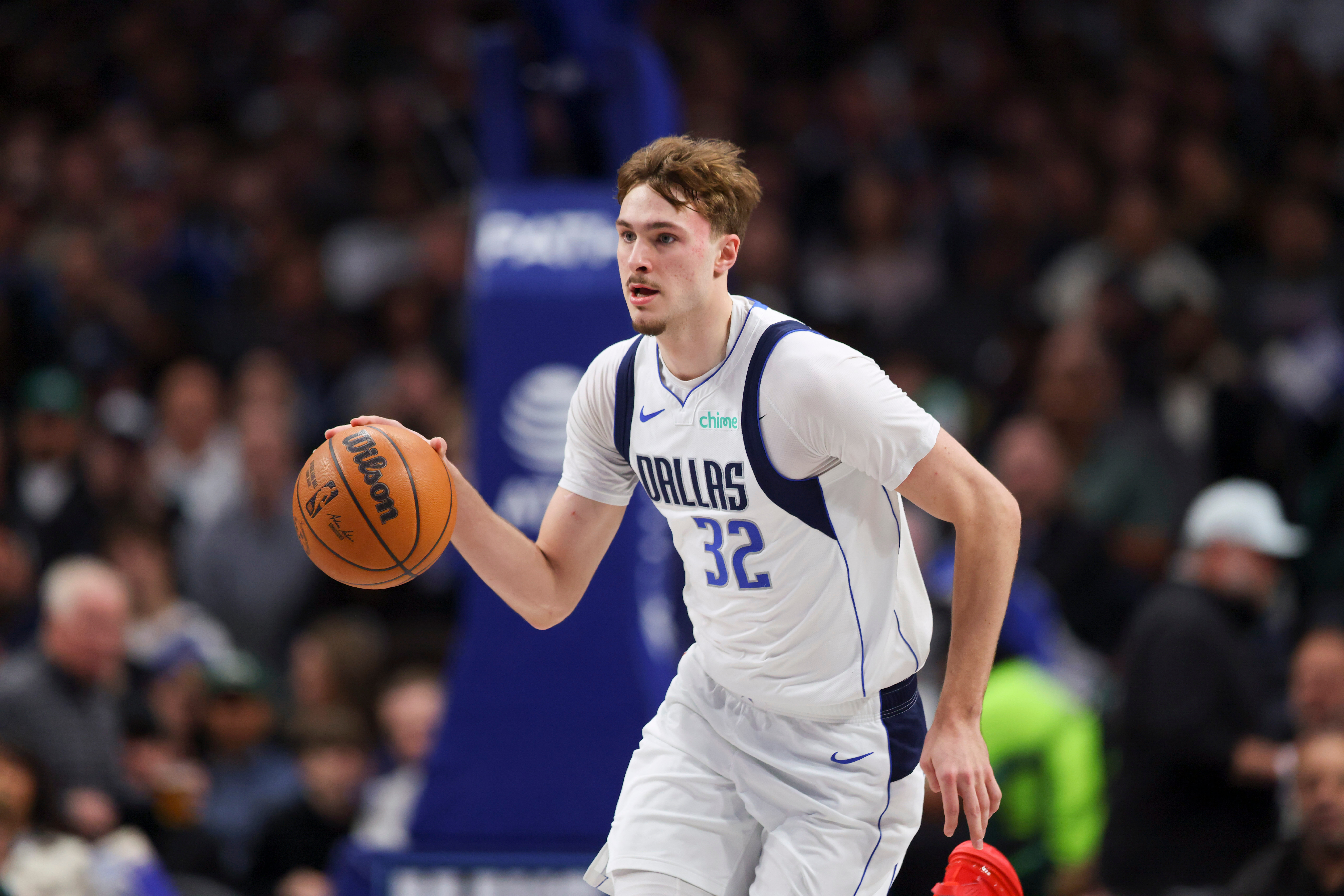Dallas Mavericks forward Cooper Flagg (32) advances the ball down court in the first half of an NBA basketball game against the San Antonio Spurs Thursday, Feb. 5, 2026, in Dallas. 