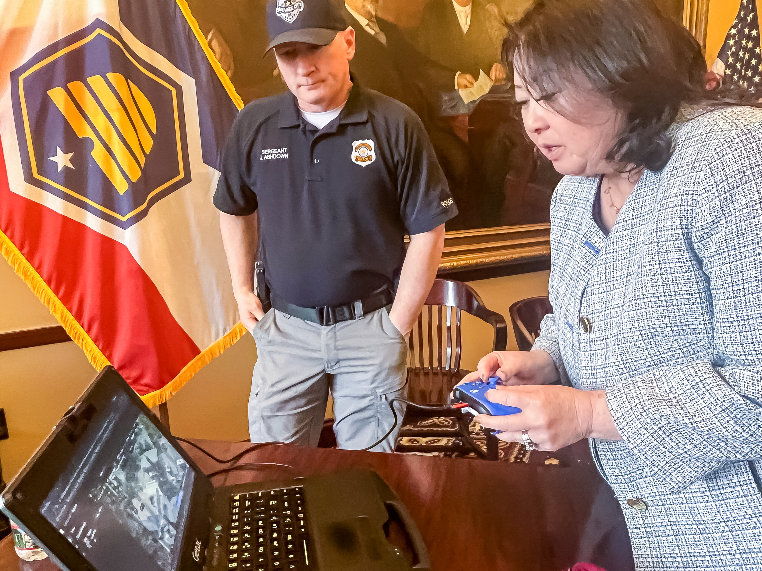 Salt Lake City Police Sgt. Joshua Ashdown demonstrates the department's drone fleet with Utah lawmakers during a celebration of Salt Lake City's 175th birthday at the Utah Capitol on Thursday.