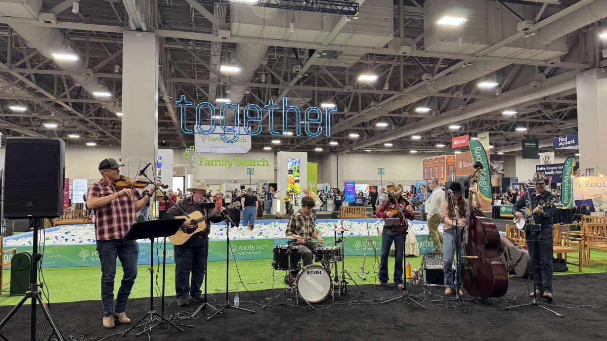 A band plays in front of a ball pit at RootsTech, an annual family history conference hosted by FamilySearch, on Thursday.