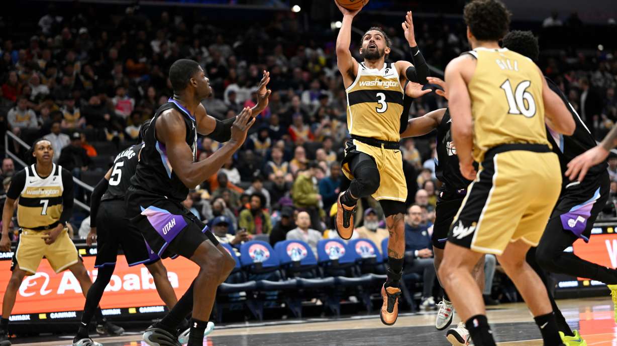 Washington Wizards guard Trae Young (3) goes to shoot during the second half of an NBA basketball game against the Utah Jazz, Thursday March 5, 2026, in Washington.