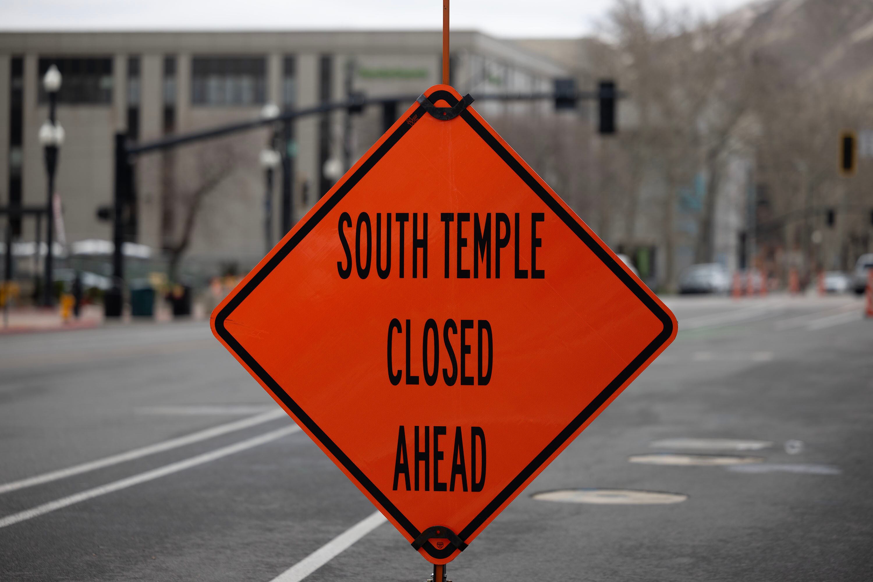Construction on South Temple progresses in Salt Lake City on Thursday. The Salt Lake City Council is considering an ordinance that would temporarily close a few downtown road segments for "public safety and crowd management" from April to October in 2027 due to the reopening of the Salt Lake Temple.