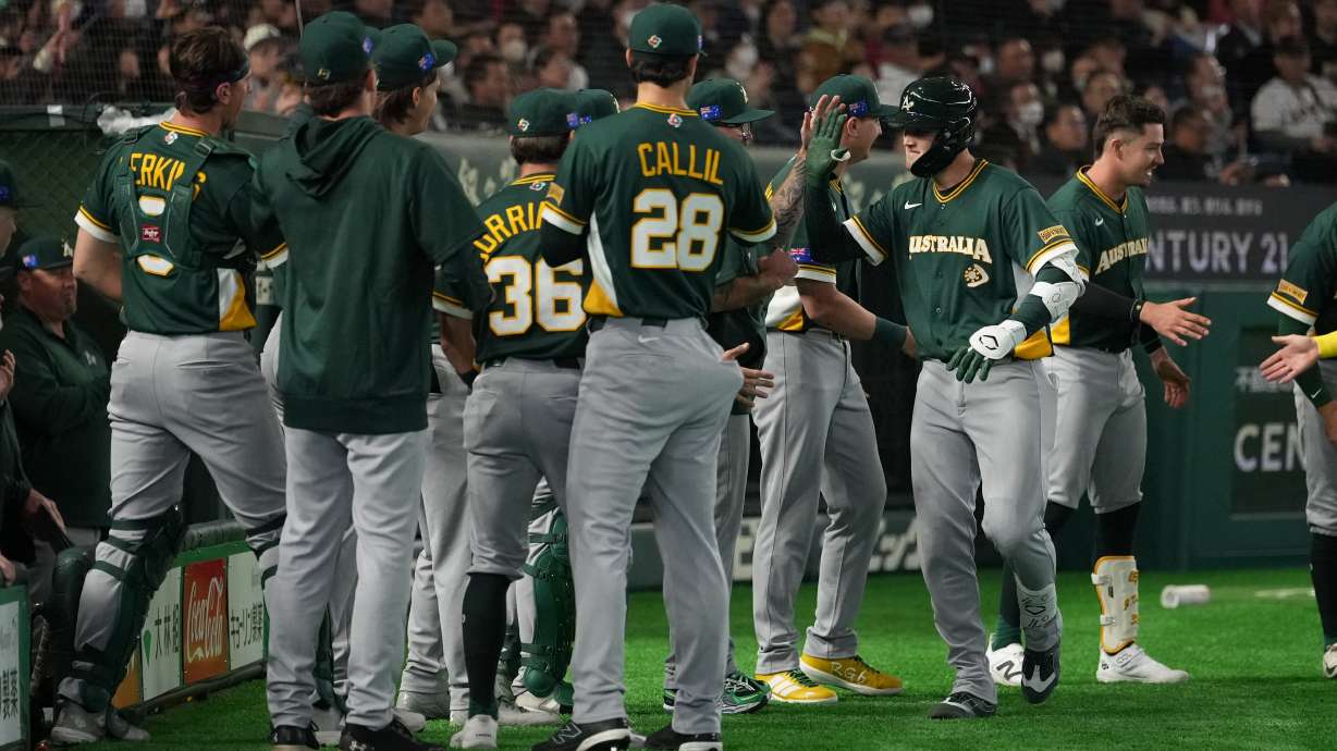 Australia's Curtis Mead celebrates after hitting a three-run home run against Czech Republic in the third inning of a World Baseball Classic game in Tokyo, Friday, March 6, 2026.