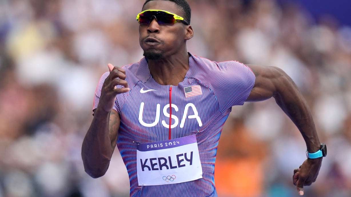 FILE - Fred Kerley, of the United States, competes in the men's 100-meter heats at the 2024 Summer Olympics, Saturday, Aug. 3, 2024, in Saint-Denis, France.