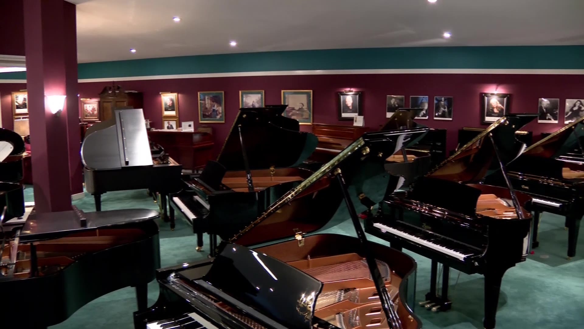 The showroom inside of Daynes Music where dozens of pianos are displayed.
