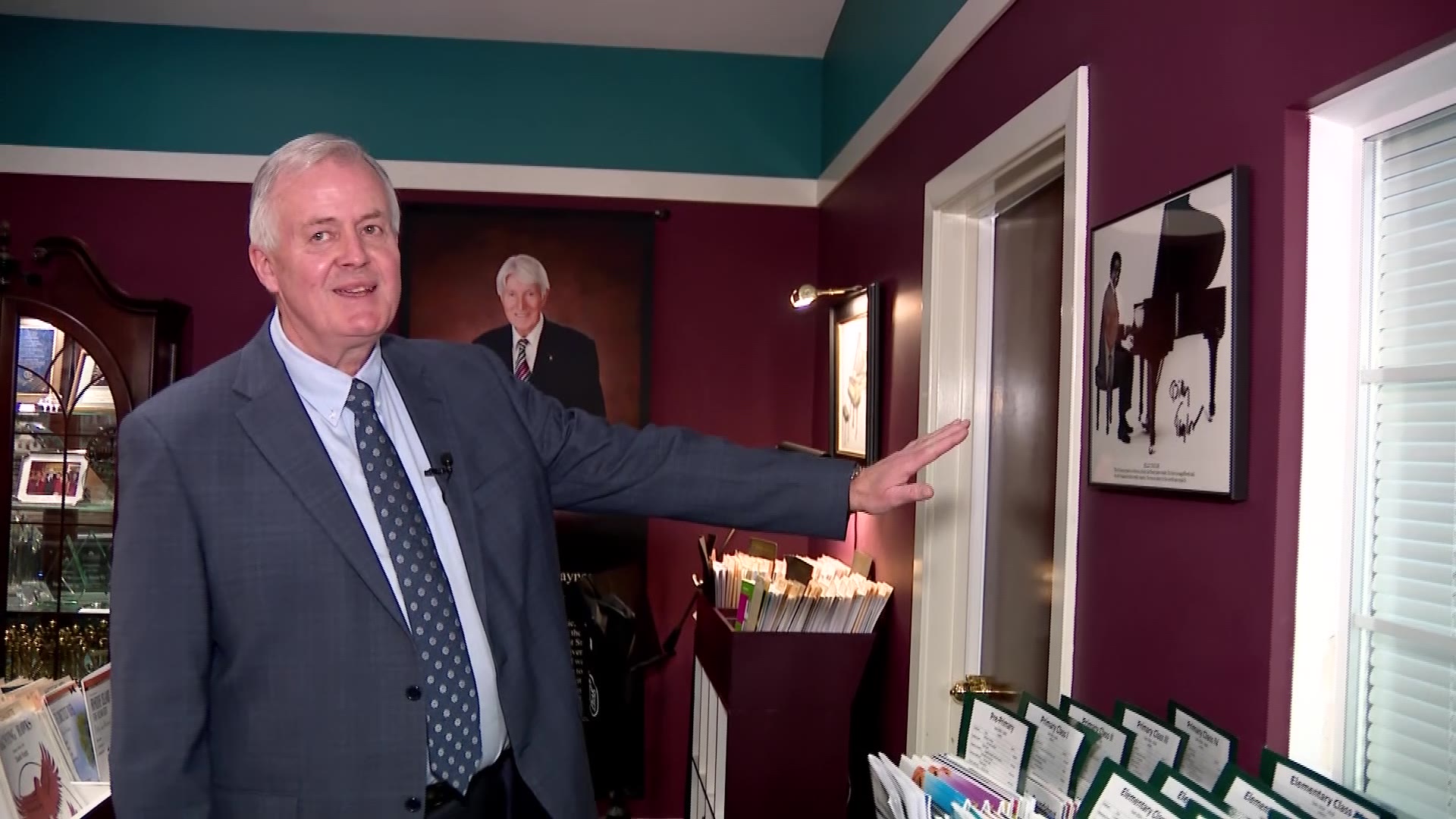 Kerwin Ipsen shows the different artists who have visited the store over the years.