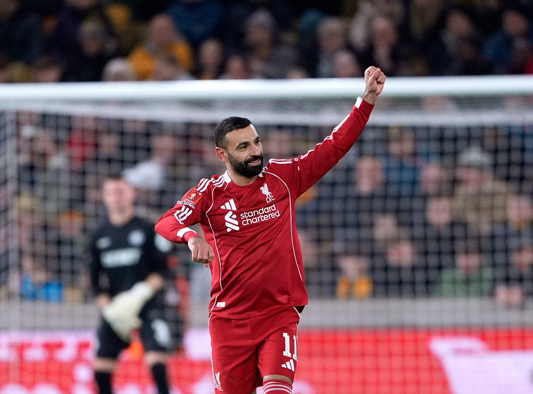 Robertson and Salah shine as Liverpool hits back to beat Wolves and reach FA Cup quarterfinals