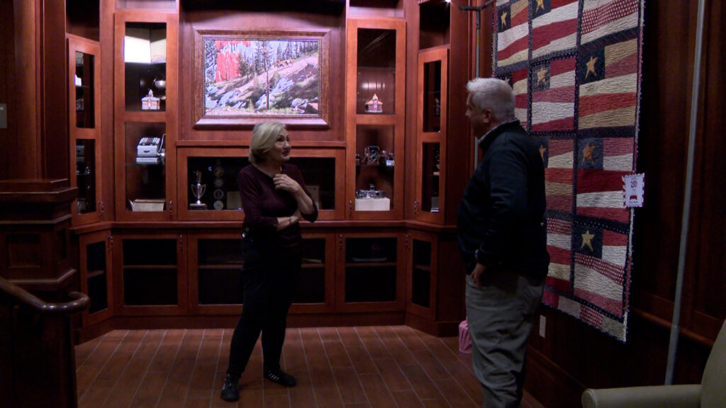 Elaine Baldwin speaks with KSL's Alex Cabrero about the patriotic quilts on display at the Garfield County Courthouse in Panguitch, Friday. Baldwin said the idea came from county leaders' discussions about participating in the America 250 celebration.