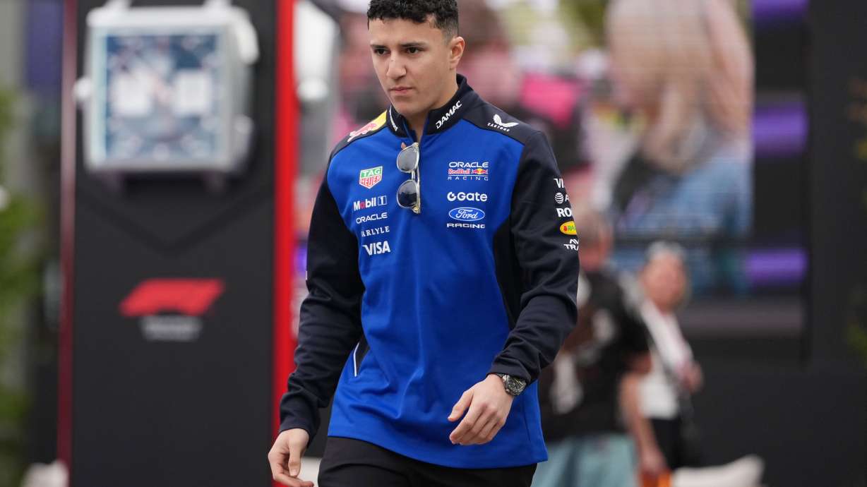 Red Bull driver Isack Hadjar of France arrives at the track ahead of the first practice session for the Australian Formula One Grand Prix at Albert Park, in Melbourne, Australia, Friday, March 6, 2026.
