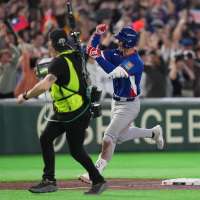 Schwarber homers and Henderson gets 4 hits to lead United States over Britain 9-1 at WBC