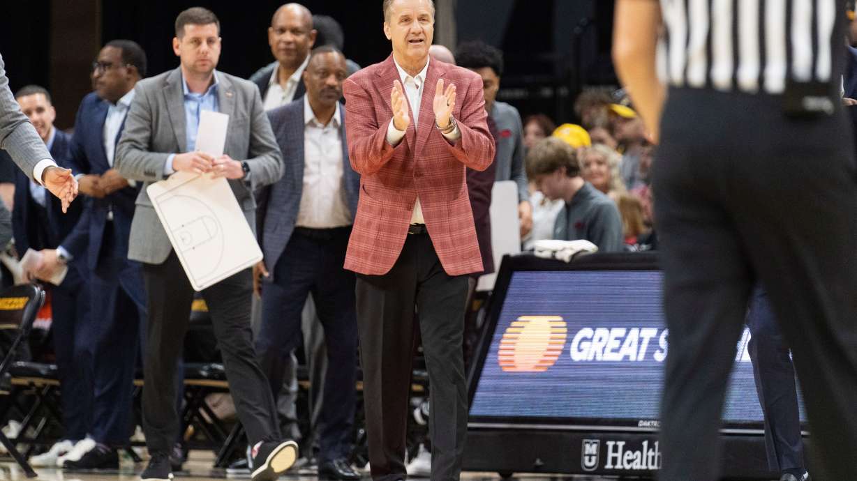 Arkansas head coach John Calipari claps during the first half of an NCAA college basketball game against Missouri Saturday, March 7, 2026, in Columbia, Mo.