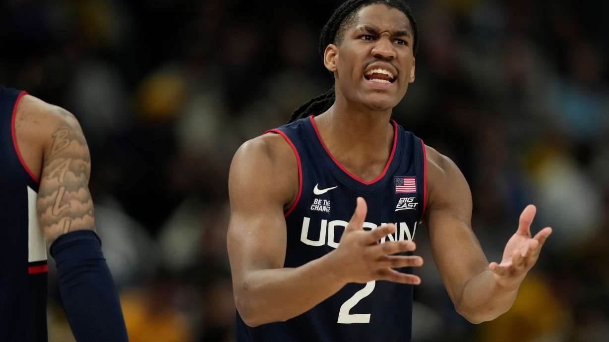 UConn's Silas Demary Jr. reacts during the first half of an NCAA college basketball game against Marquette, Saturday, March 7, 2026, in Milwaukee.