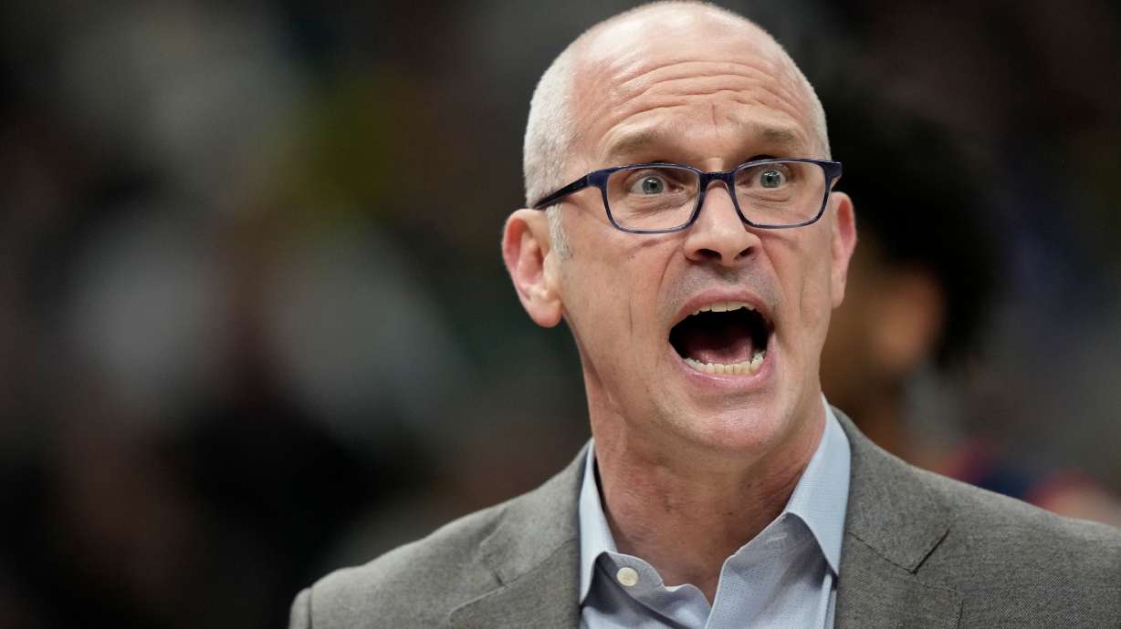 UConn head coach Dan Hurley reacts during the first half of an NCAA college basketball game against Marquette, Saturday, March 7, 2026, in Milwaukee.