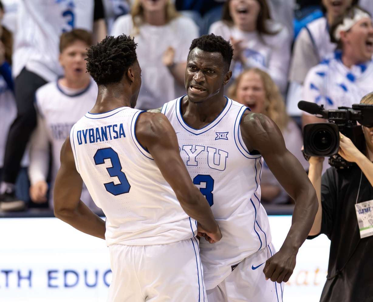 BYU Cougars forward AJ Dybantsa (3) celebrates with BYU Cougars center Keba Keita (13) as they play the Texas Tech Red Raiders at the Marriott Center in Provo, on Saturday, March 7, 2026. BYU won 82-76.