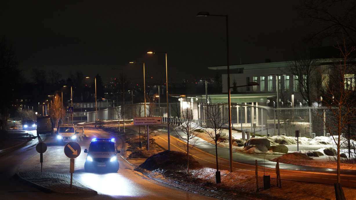 Norwegian police attend outside the U.S. Embassy in Oslo, Norway in the early hours of Sunday.