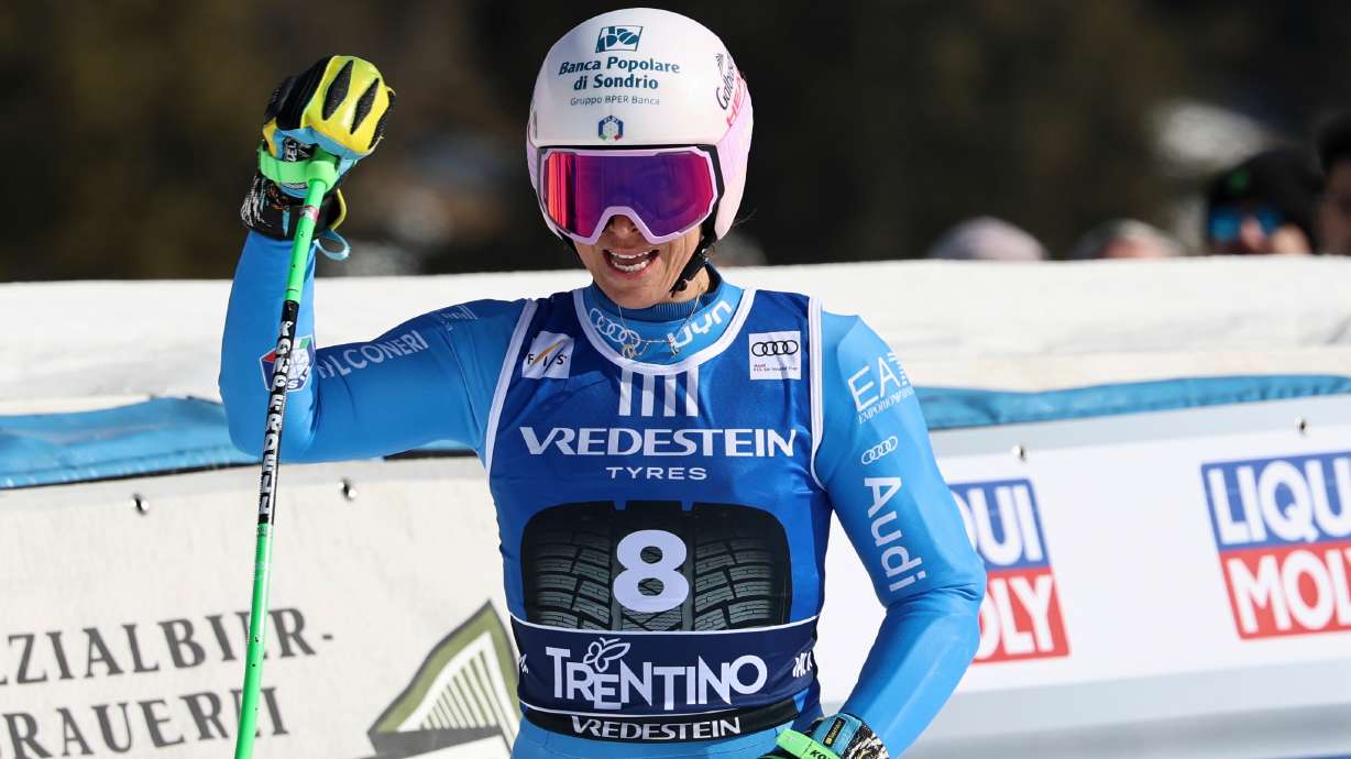 Italy's Elena Curtoni celebrates at the finish area of an alpine ski, women's World Cup super-G, in Val di Fassa, Italy, Sunday, March 8, 2026.