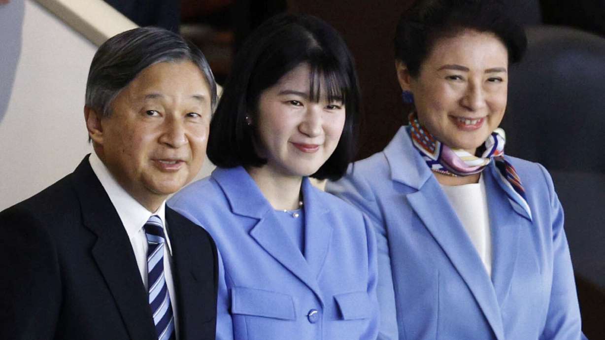 Japan's Emperor Naruhito, Empress Masako, right, and their daughter Princess Aiko watche a World Baseball Classic game between Japan and Australia, in Tokyo Sunday, March 8, 2026.