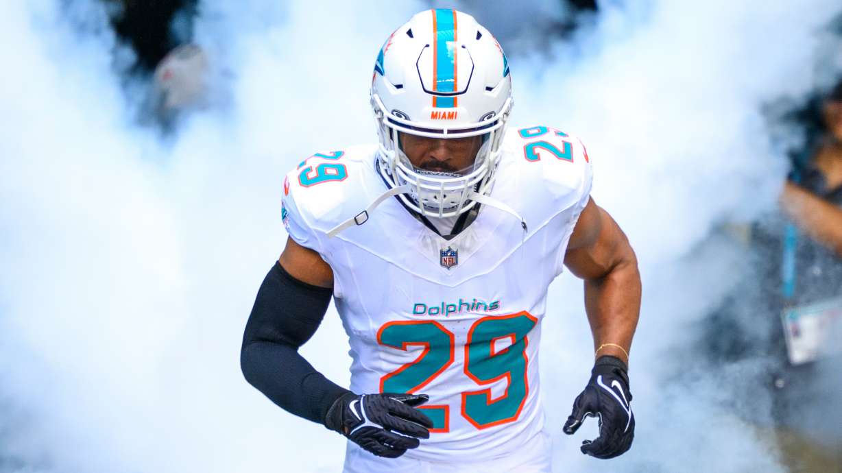 FILE - Miami Dolphins safety Minkah Fitzpatrick runs onto the field during player introductions before an NFL football game against the Buffalo Bills, Nov. 9, 2025, in Miami Gardens, Fla.