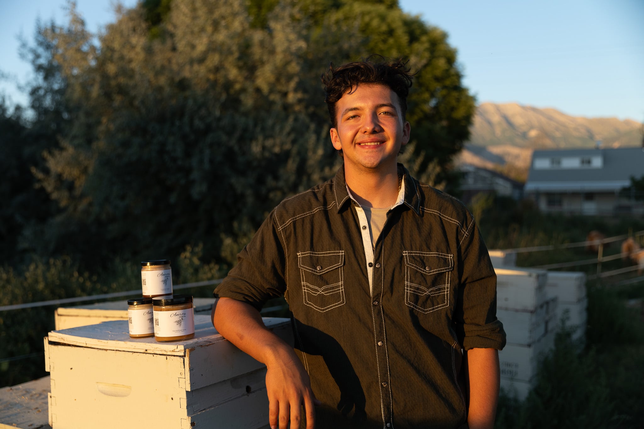 Jethro Peretto, 19, of Saratoga Springs, is rebuilding his business after a fire destroyed his honey stock. Peretto has been beekeeping since he was 3 years old.