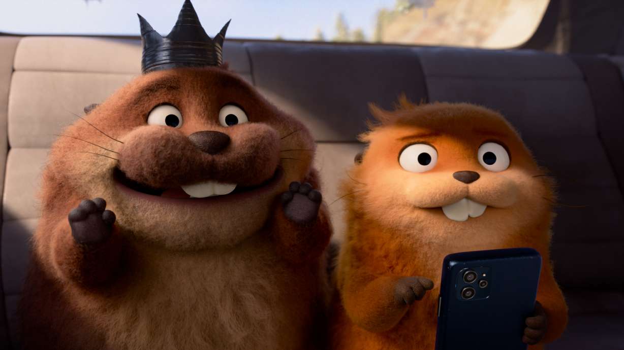 This image released by Disney shows Mabel Beaver, voiced by Piper Curda, right, and King George, voiced by Bobby Moynihan, in a scene from the animated film "Hoppers."