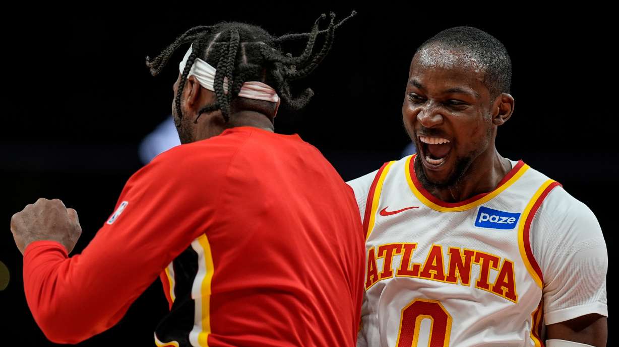 Atlanta Hawks forward Jonathan Kuminga (0) celebrates his basket against the Portland Trail Blazers during the second half of an NBA basketball game, Sunday, March 1, 2026, in Atlanta.