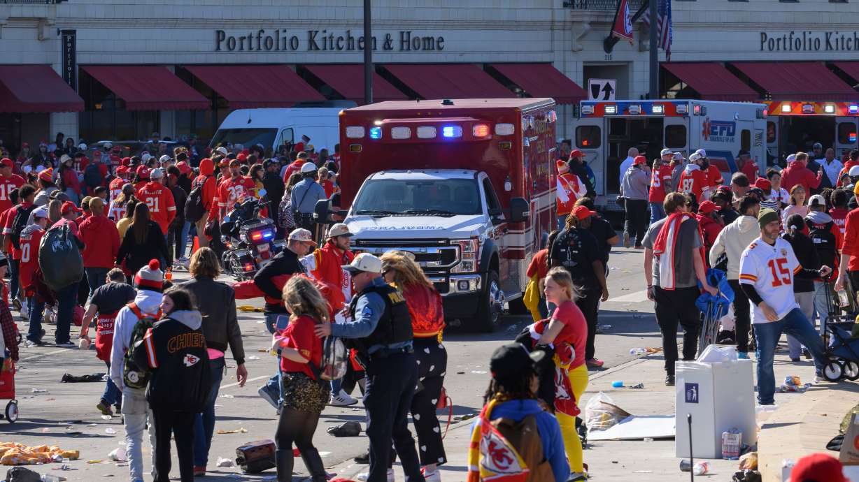 FILE - Police clear the area following a shooting at the Kansas City Chiefs NFL football Super Bowl celebration, in Kansas City, Mo., Feb. 14, 2024.