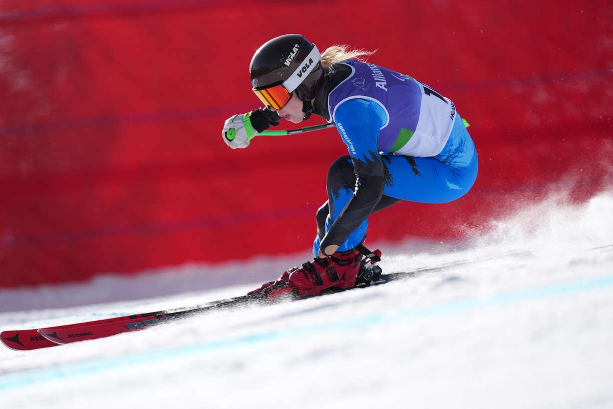 Varvara Voronchikhina, of Russia, competes in the alpine skiing women's downhill standing competition at the 2026 Winter Paralympics, in Cortina d'Ampezzo, Italy, Saturday.