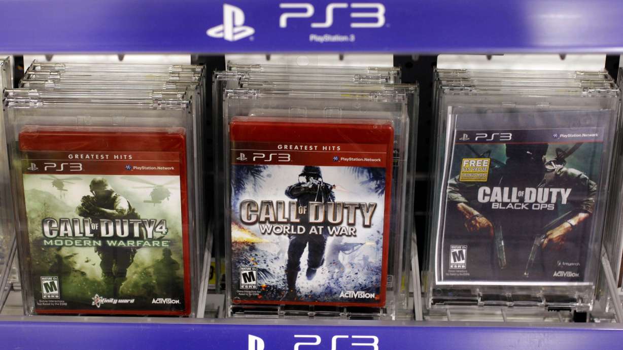 FILE - Three versions of Activision's Call Of Duty games are seen on sale at Best Buy, in Mountain View, Calif., Wednesday, Aug. 3, 2011.