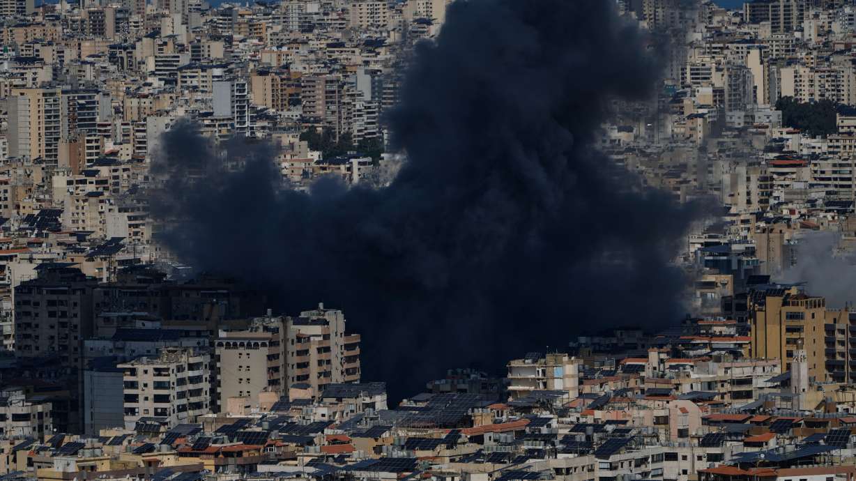 Smoke rises following an Israeli airstrike in Dahiyeh, Beirut's southern suburbs, Monday.