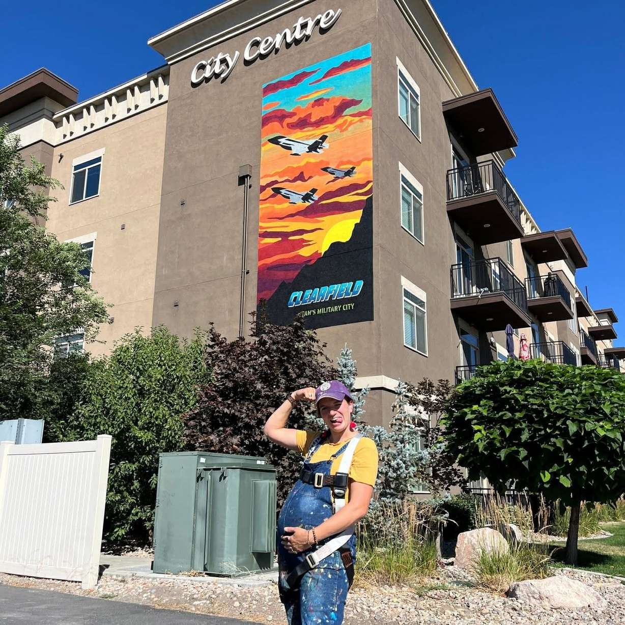 Brooke Facer, a wife, mother and business owner designed and painted multiple murals for the city of Clearfield during her pregnancy last summer.