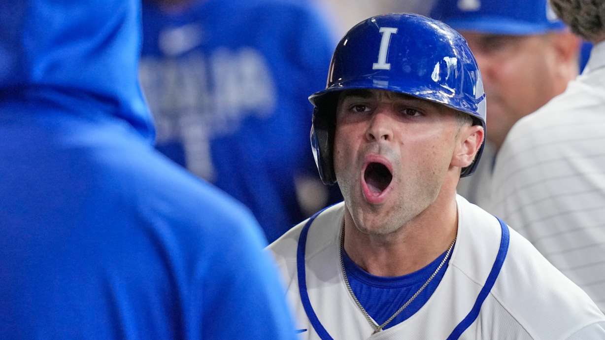 Italy's Dante Nori, right, celebrates after hitting a home run against Brazil during the seventh inning of a World Baseball Classic game, Saturday, March 7, 2026, in Houston.