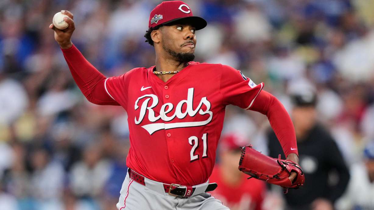 FILE Cincinnati Reds starting pitcher Hunter Greene throws to a Los Angeles Dodgers batter during the first inning in Game 1 of the National League Wild Card baseball playoff series, Sept. 30, 2025, in Los Angeles.