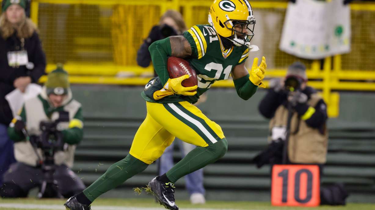 FILE - Green Bay Packers cornerback Nate Hobbs returns a kick off during an NFL football game between the Green Bay Packers and Baltimore Ravens, Dec. 27, 2025, in Green Bay, Wis.