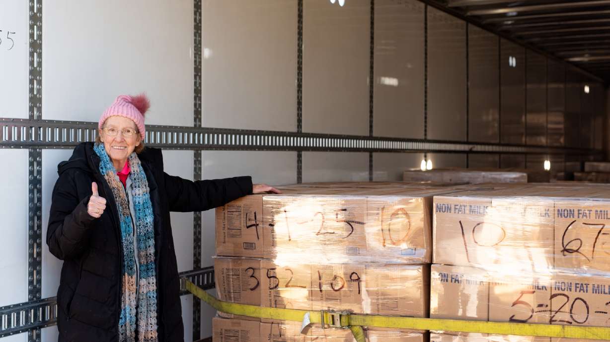 Barb Smith, chair of FISH of Grand Blanc, welcomes a food donation from The Church of Jesus Christ of Latter-day Saints in Grand Blanc, Michigan, on Nov. 19, 2025.