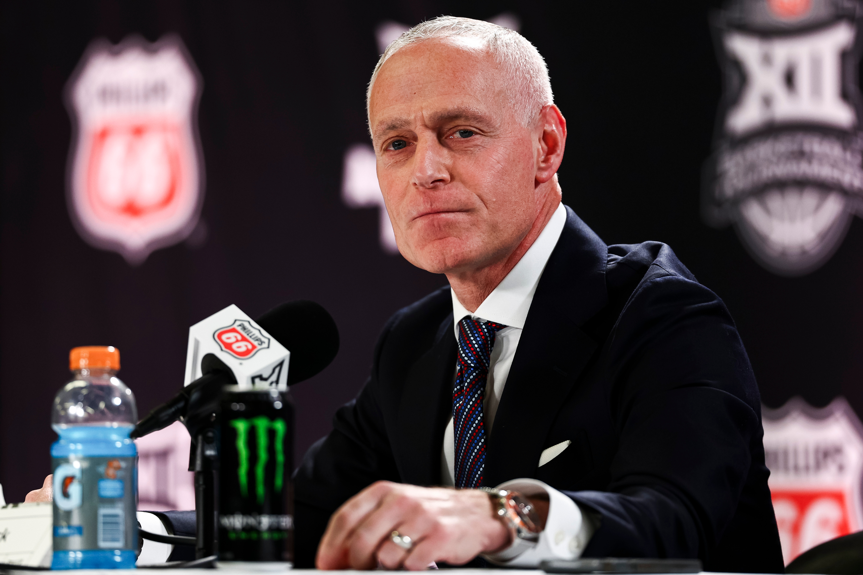 Big 12 Commissioner Brett Yormark speaks at a press conference during the 2026 Phillips 66 Big 12 Men's Basketball Tournament at the T-Mobile Center in Kansas City, Missouri, on Tuesday, March 10, 2026.