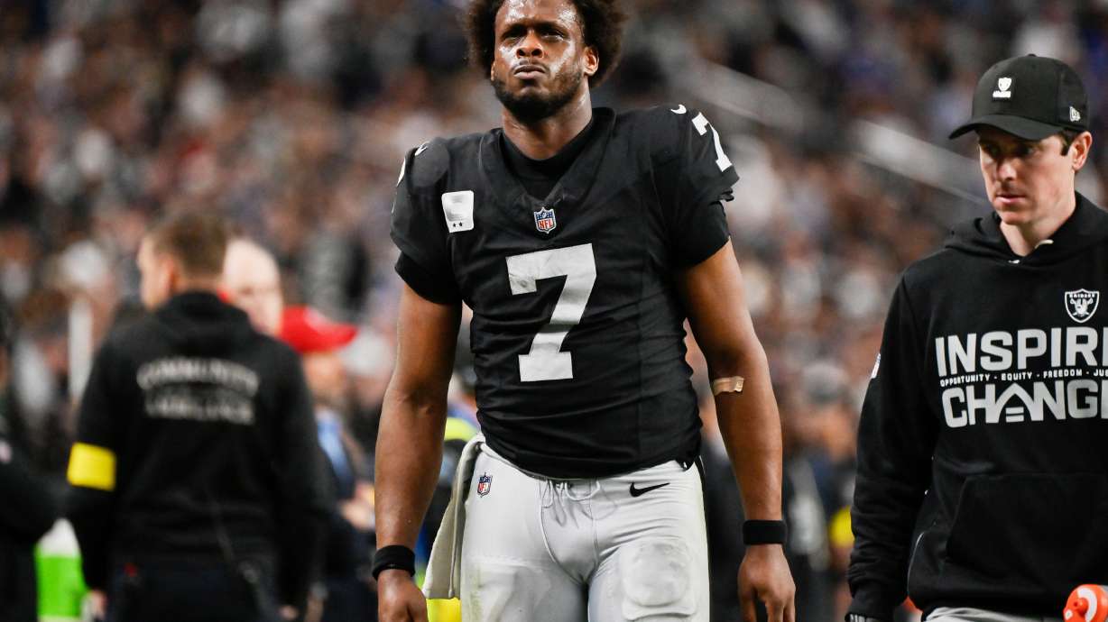 FILE - Las Vegas Raiders quarterback Geno Smith (7) leaves the field during the second half of an NFL football game against the New York Giants, Dec. 28, 2025, in Las Vegas.