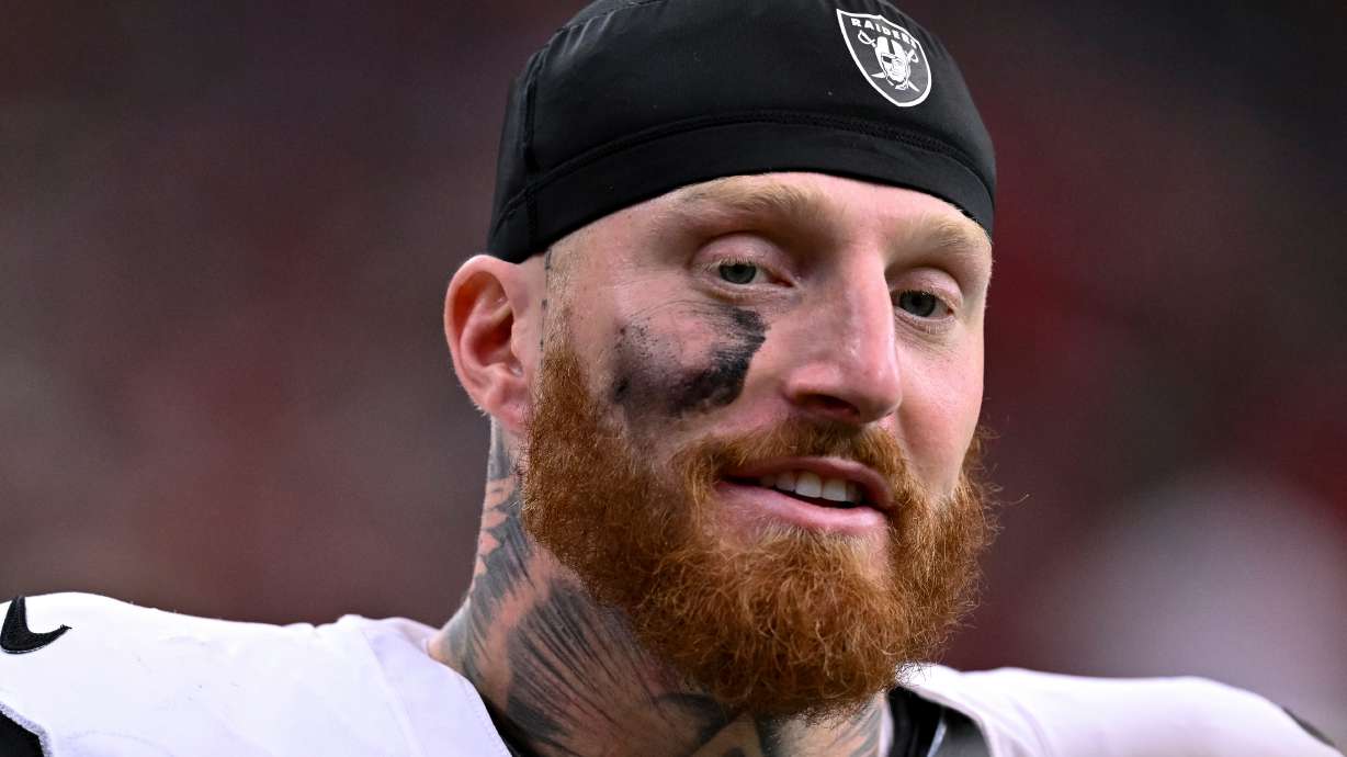 FILE - Las Vegas Raiders defensive end Maxx Crosby (98) looks on during the first half of an NFL football game against the Houston Texans, Dec. 21, 2025, in Houston.