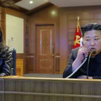 North Korean leader Kim watches cruise missile tests with his daughter