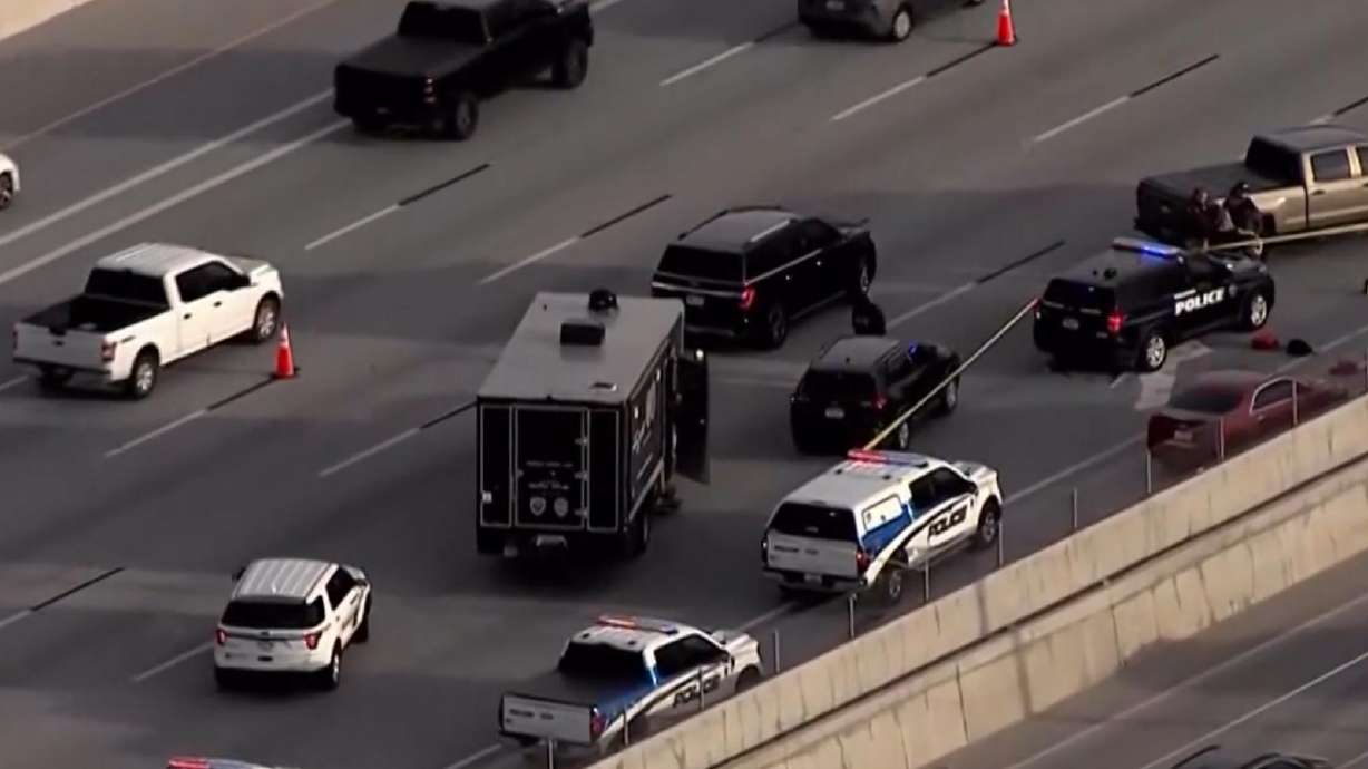 The scene of a police shooting on I-15 in Draper on Tuesday. A man shot during a confrontation with officers has died, police said Wednesday.