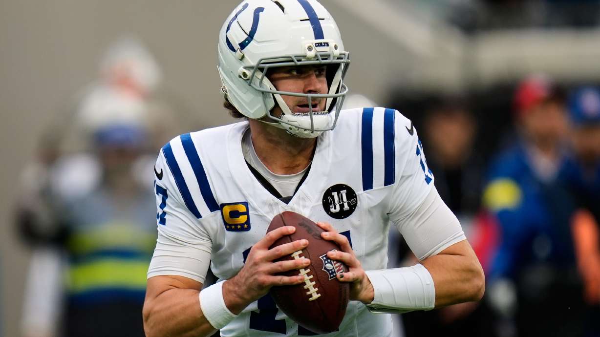 FILE - Indianapolis Colts quarterback Daniel Jones looks for a receiver during the first half of an NFL football game against the Jacksonville Jaguars, Dec. 7, 2025, in Jacksonville, Fla.