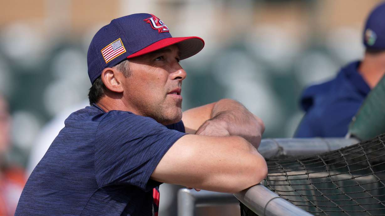 United States manager Mark DeRosa watches batting practice prior to an exhibition baseball game against the Colorado Rockies Wednesday, March 4, 2026, in Scottsdale, Ariz.