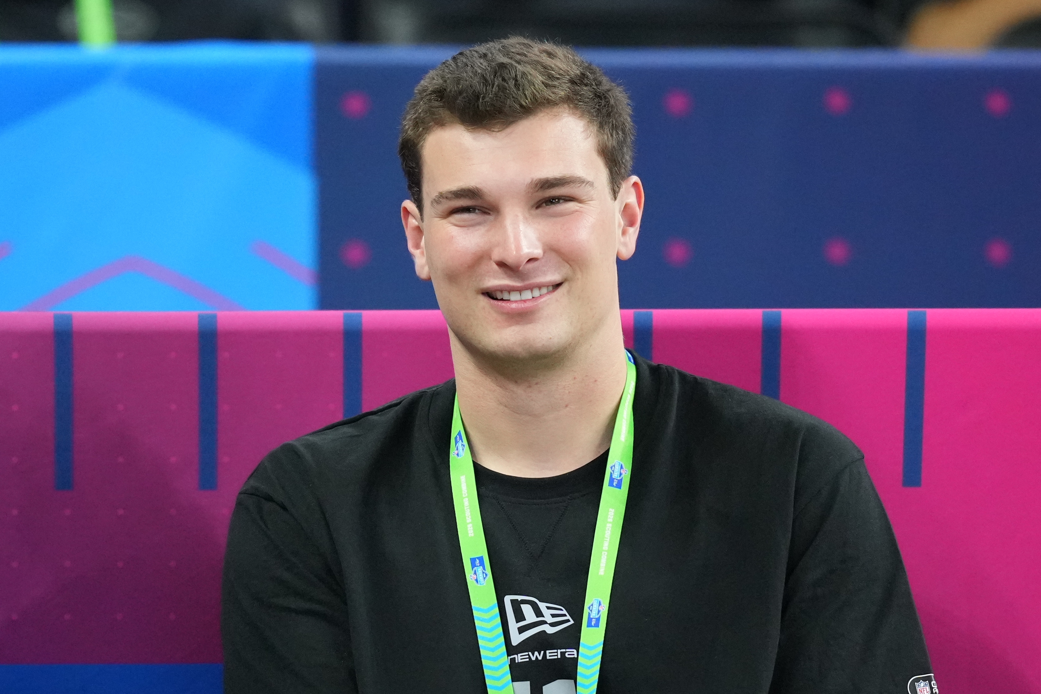 Indiana quarterback Fernando Mendoza (11) watches a drill at the NFL football scouting combine in Indianapolis, Saturday, Feb. 28, 2026.