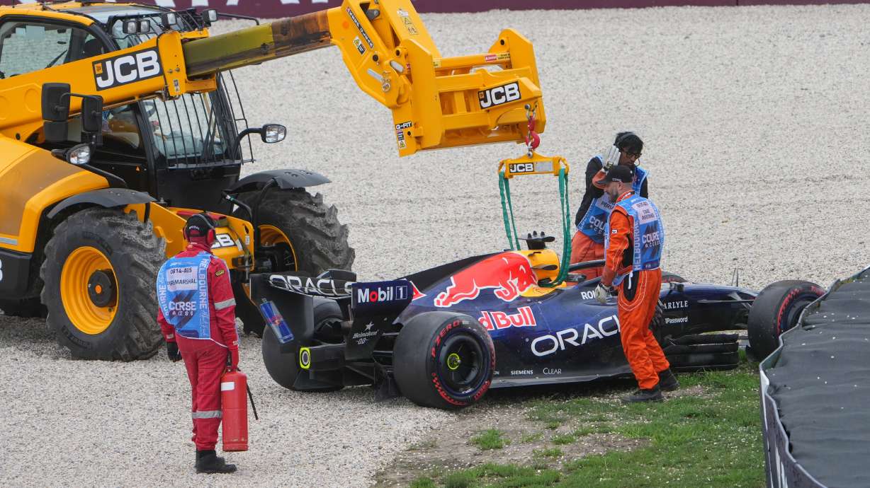 Red Bull driver Max Verstappen of the Netherlands' car is taken from the track after a crash during the qualifying session for the Australian Formula One Grand Prix at Albert Park, in Melbourne, Australia, Saturday, March 7, 2026.