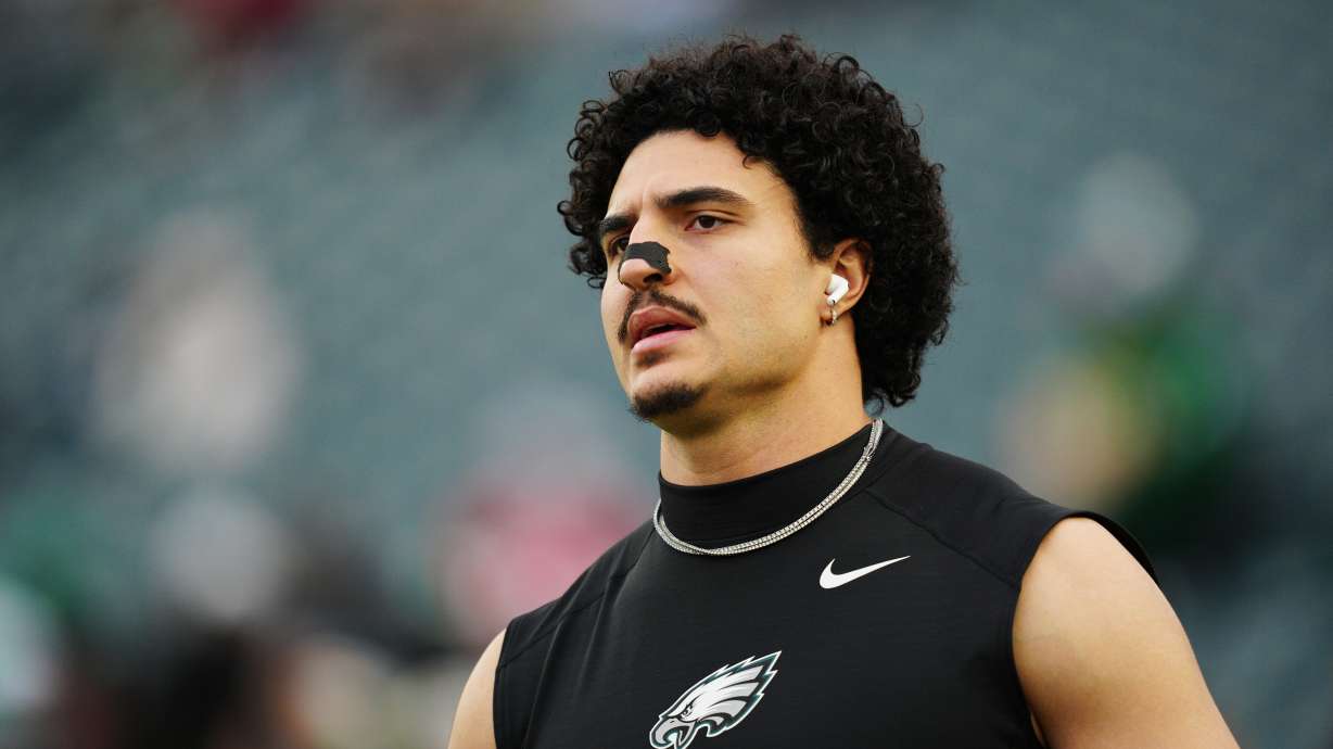 FILE - Philadelphia Eagles linebacker Jaelan Phillips warms up before an NFL wild-card playoff football game against the San Francisco 49ers on Jan. 11, 2026, in Philadelphia.