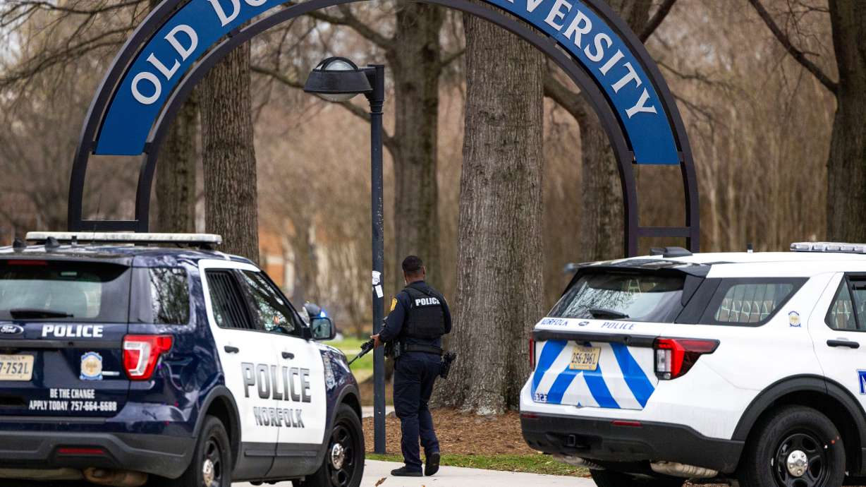 Police arrive outside Old Dominion University's campus after reports of an active shooter on Thursday in Norfolk, Va.