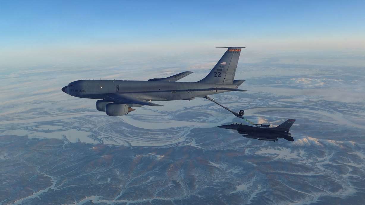 This photo provided by the U.S. Department of Defense shows a North American Aerospace Defense Command F-16 fighter refueling from a KC-135 Stratotanker over western Alaska on Feb. 19. Six people died when a refueling plane crashed in Iraq.