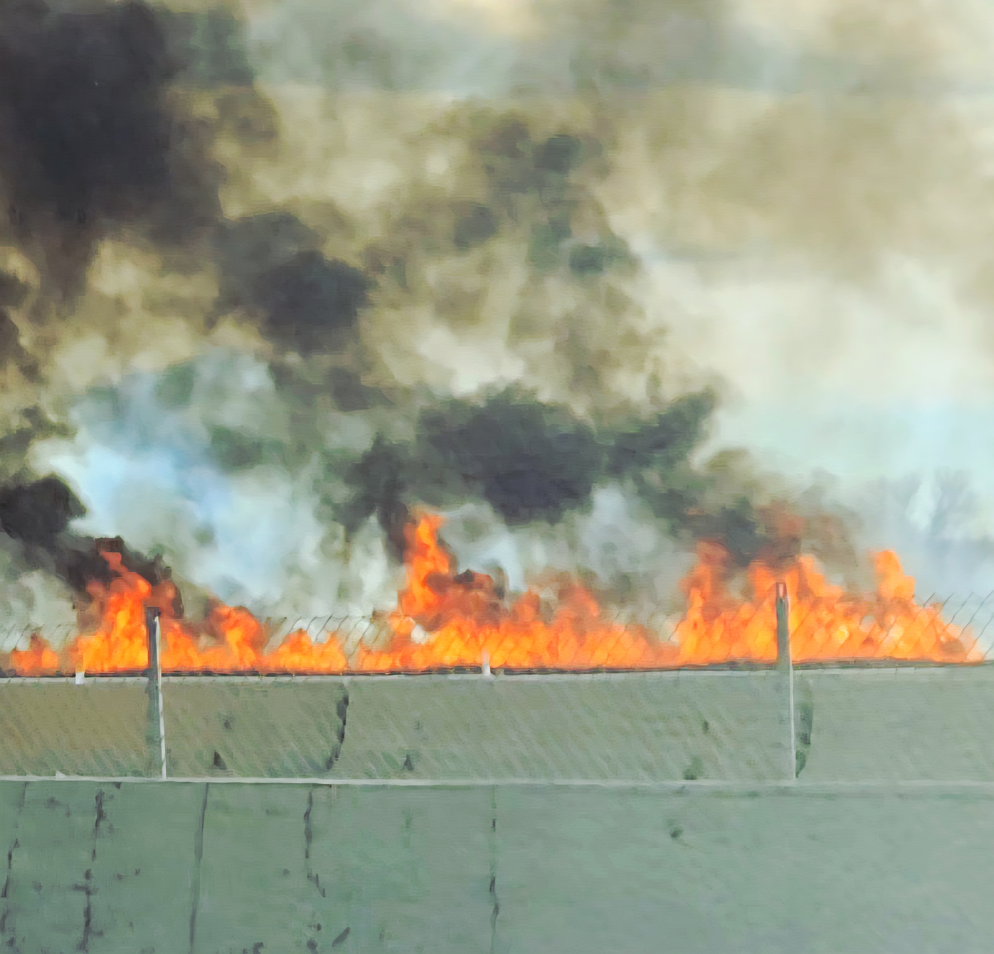 A brush fire burning in brush near the border of Provo and Springville on Thursday.