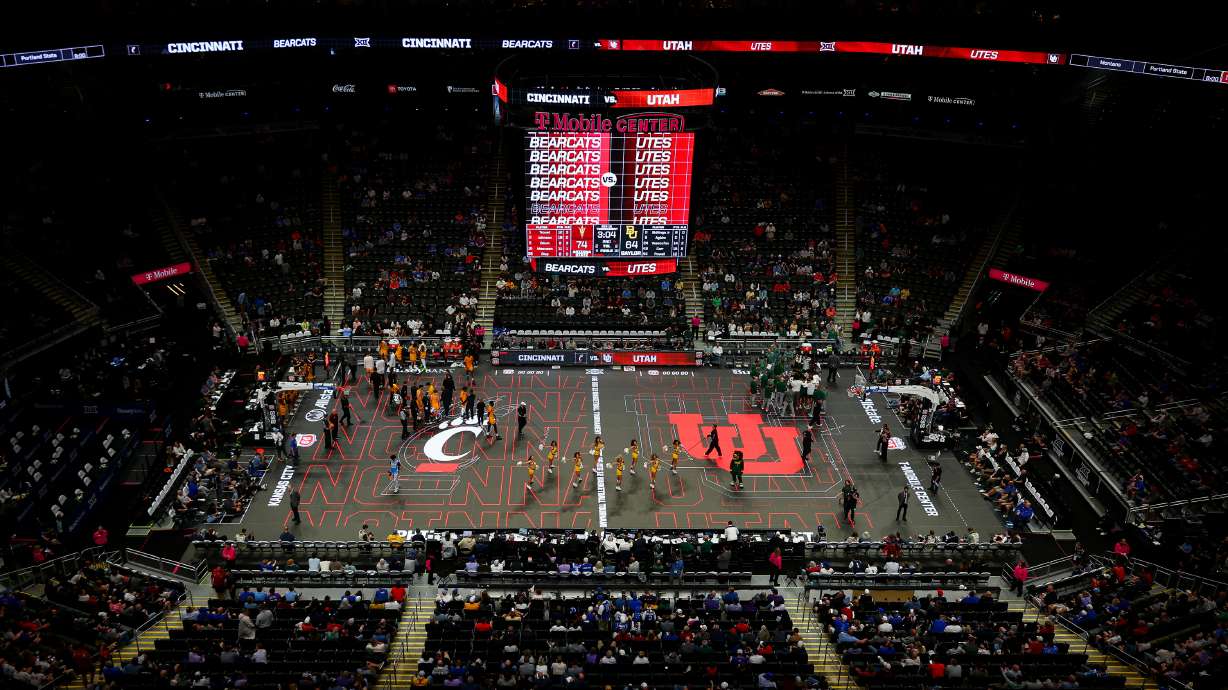 The ASB GlassFloor displays a preview for the upcoming game between the Cincinnati Bearcats and Utah during a timeout during the game between the Arizona State Sun Devils and the Baylor Bears during the 2026 Phillips 66 Big 12 Men's Basketball Tournament at the T-Mobile Center in Kansas City, Missouri, on Tuesday, March 10, 2026.