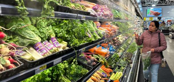 US economy expanded at sluggish 0.7% in fourth quarter, downgrading first estimate